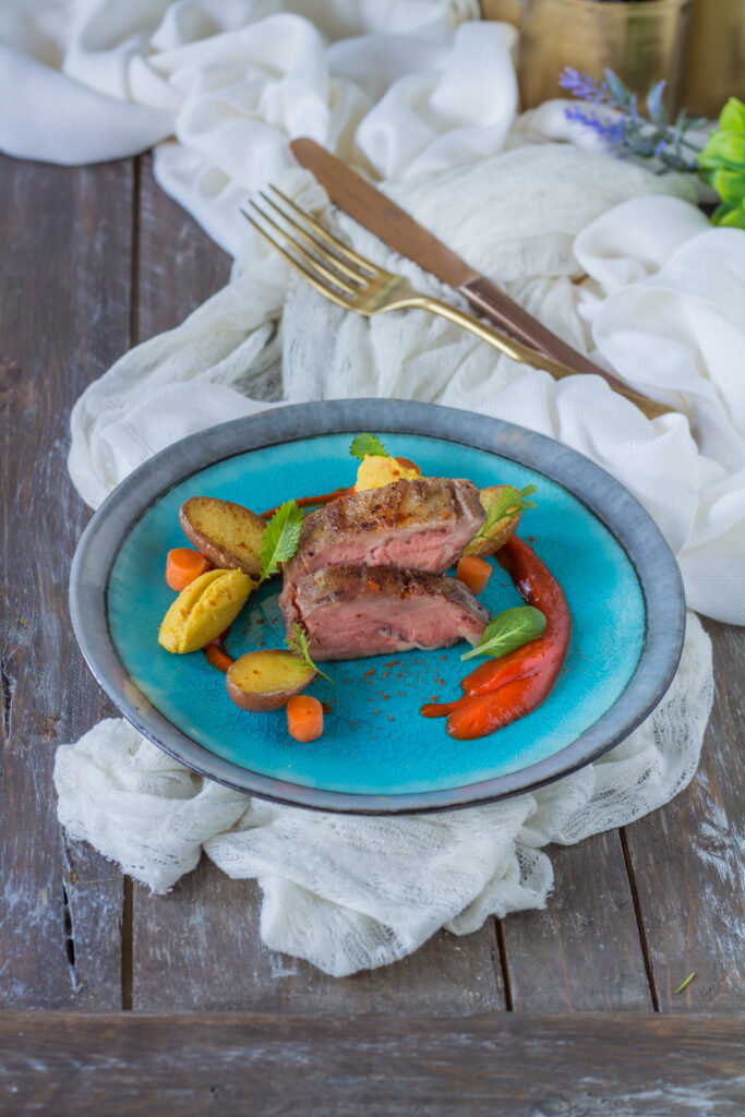 pluma di maiale iberico ricetta sous vide con paperoni del piquillo