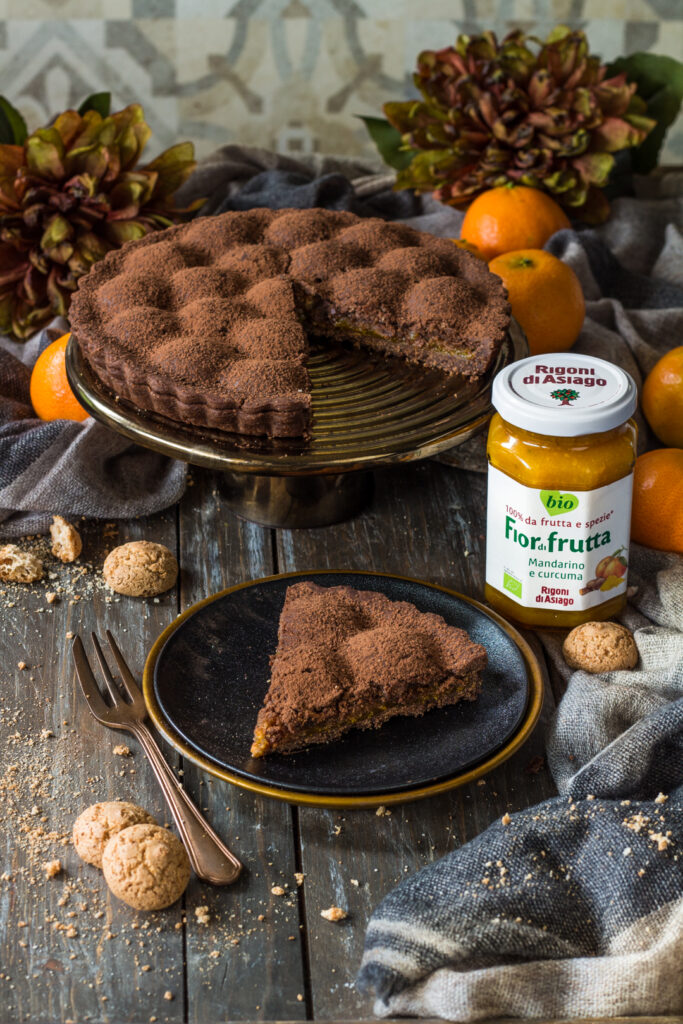 fetta di crostata amaretti e cacao rigoni di asiago